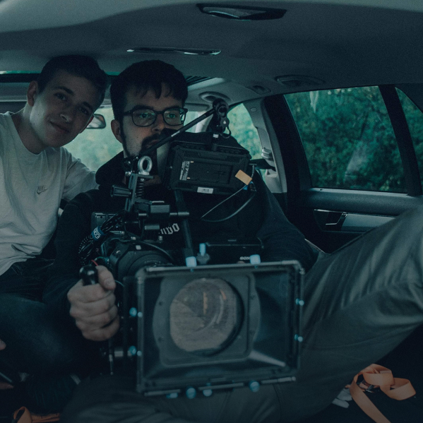 Linus filming from inside a car